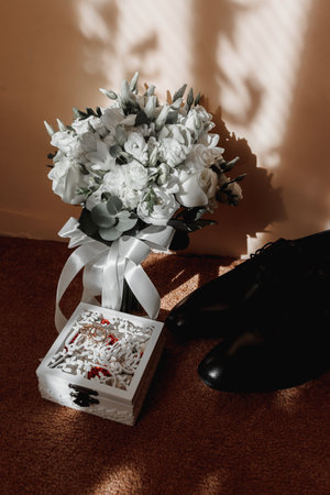 wedding bouquet in the rays and shadows of the falling sun