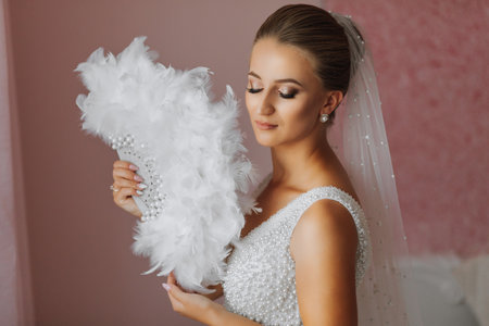 portrait of a beautiful girl in a wedding dress. Fashion, glamour, concepts. The morning of the...