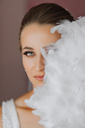 portrait of a beautiful girl in a wedding dress. Fashion, glamour, concepts. The morning of the...
