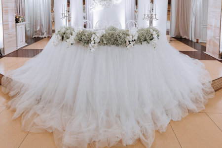 Presidium of the bride and groom at the wedding. Everything is almost ready for the wedding celebration. Wedding banquetの写真素材