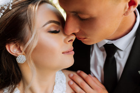 Sensual couple in tender passion. Close-up portrait of a woman about to kiss a man. Couple in love kissing. Sexy lips. Black and white photoの写真素材