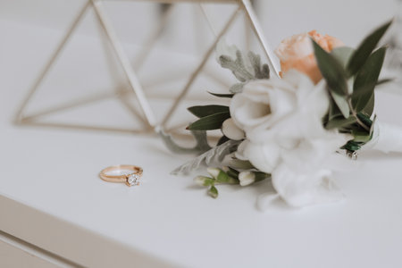 Bride's engagement ring, stilettos, Perfume. Wedding details of the bride. Flowers Beautiful light. wedding dressの写真素材