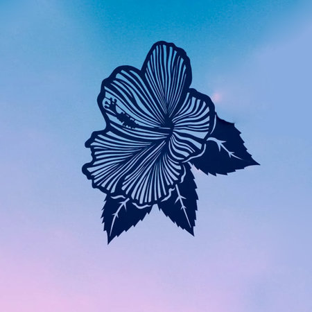 A black flower against a blue sky. Cut out of paper.の写真素材