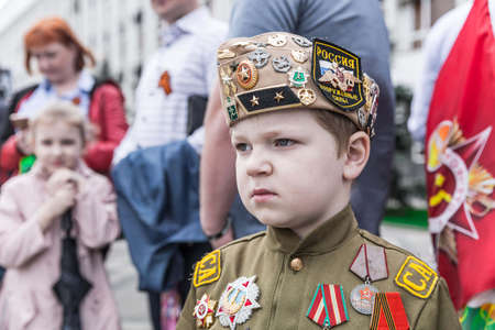 Krasnodar, Russia - May 9, 2019: Celebrating victory day in Russia in the city of Krasnodar. Immortal regiment and children in a procession.のeditorial素材