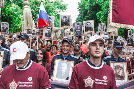 Krasnodar, Russia - May 9, 2019: Celebrating victory day in Russia in the city of Krasnodar. Immortal regiment and children in a procession.のeditorial素材