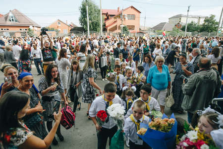 Krasnodar, Russia - May 9, 2019: Celebrating victory day in Russia in the city of Krasnodar. Immortal regiment and children in a procession.のeditorial素材