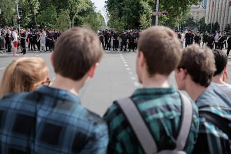 Krasnodar, Russia - August 10, 2019: Police stand in a cordon at an unsanctioned opposition rally. Suppression of rights and freedoms in Russia.のeditorial素材