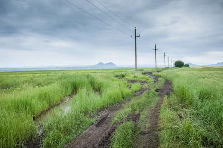 Power line supports. Electricity transmission and posts.