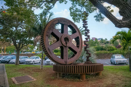 two large gears and a knee-jerk engine. Monument monument to the railway.の写真素材