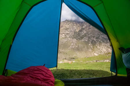 View from the tourist tent to the mountain. Tourist's tent.の写真素材