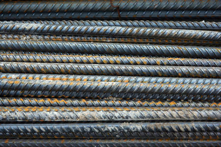 The bars of the rusty steel fittings. Construction of a textured background.