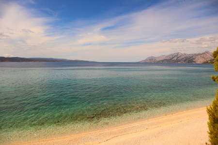 Picturesque panorama of the Croatian sea coast, view of the turquoise blue transparent sea and the...