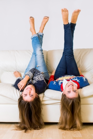Two beautiful girls headfirstの写真素材