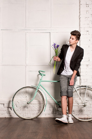 Young man on bicycleの写真素材