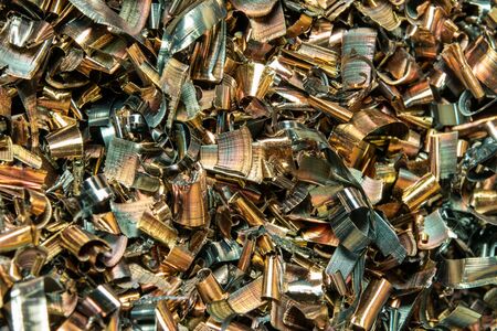 IMetal shavings close-up multicolored. the waste after processing of metal drill to the lathe.の写真素材