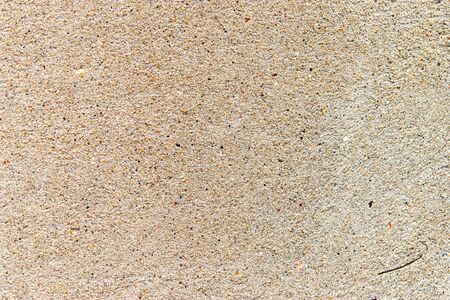 Textured sand plaster, close-up, abstract background.の写真素材