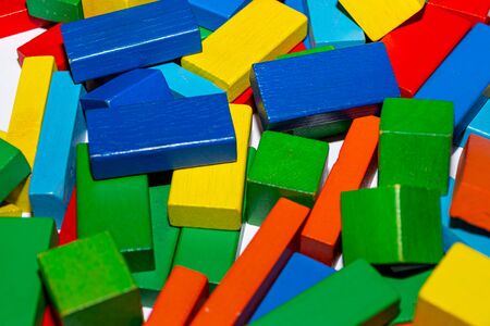 Colorful inexpensive cubes from an orphanage. Wooden cubes for orphaned children.