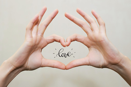 Fingers in heart shape. Loveの写真素材