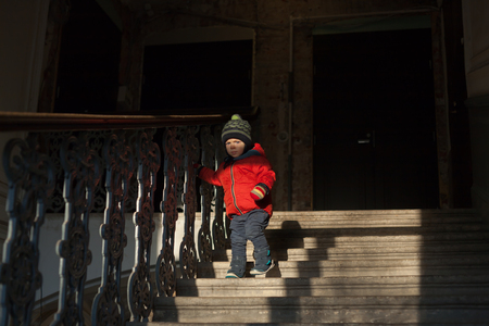 little boy down the stairs.の写真素材