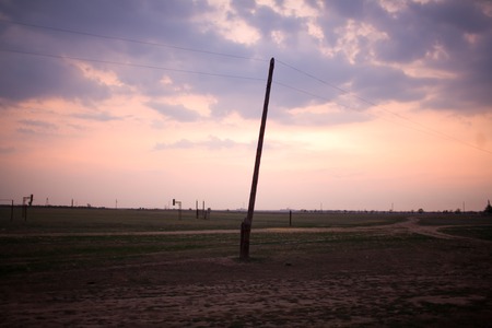 View rickety pole in a village in the South of Russia. decline concept.の写真素材
