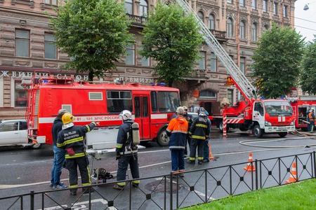 Saint Petersburg, Russia, on the morning of September 13, 2017. Firefighters extinguish a large fire on the roof of a residential house on the street Tchaikovsky 31のeditorial素材