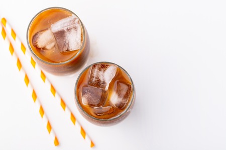 Ice latte top view close up on white background and clipping paths. With copy space