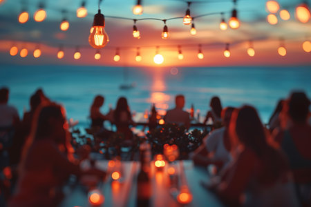 blur people picnic in a public Park with family or friends. the food festival at night.の素材