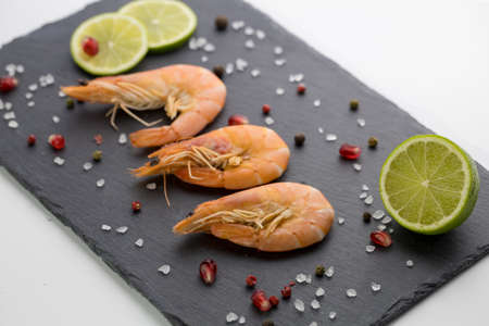Large shrimp with lemon. Top view. Free space for your text. On the white background.の写真素材