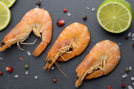 Large shrimp with lemon. Top view. Free space for your text. On the white background.の写真素材