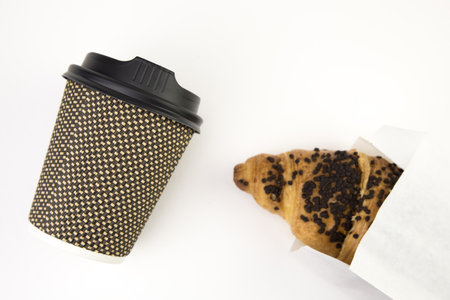 croissant with chocolate on white isolatedの写真素材