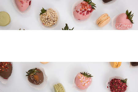 Assorted strawberries in chocolate, sweet dessert, berries in different chocolate and sprinkled with nuts.の写真素材