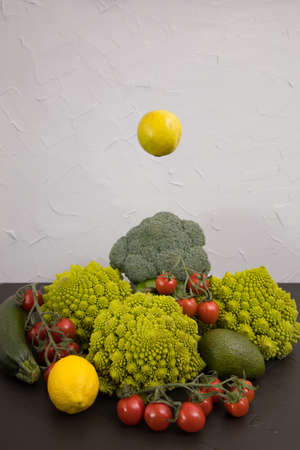 Healthy vegetarian food, fresh green food, green vegetable, romanesco broccoli, pepper, zucchini and avocado on a isolated (Green vegetable)の写真素材