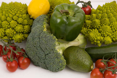 Healthy vegetarian food, fresh green food, green vegetable, romanesco broccoli, pepper, zucchini and avocado on a isolated (Green vegetable)の写真素材