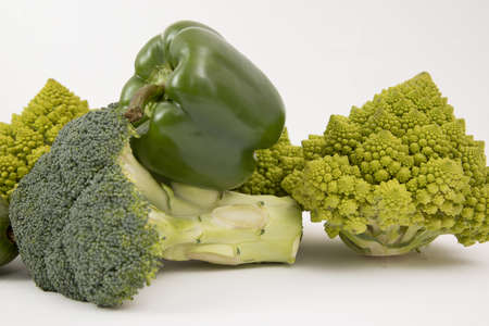 fresh green food, green vegetable, romanesco broccoli, pepper, zucchini and avocado on a isolated Background.の写真素材
