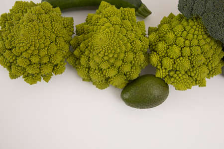fresh green vegetable, romanesco broccoli, pepper, zucchini, avocado, free space in your text, on a isolated background.の写真素材
