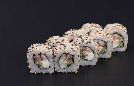 Sushi Rolls Unagi Sesame with RICE, EEL, cucumber, CREAM and SESAME.の写真素材