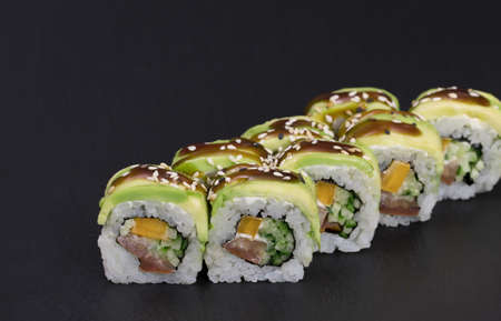 Sushi rolls Roll on black background. Sushi menu. Japanese food.の写真素材