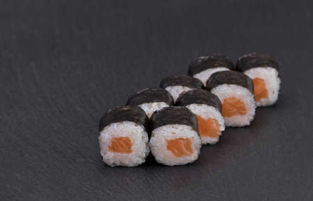 Sushi rolls Roll on black background. Sushi menu. Japanese food.の写真素材