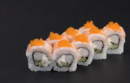 Sushi Rolls Suri Ebi Maki with RICE, TIGER SHRIMPS, CRAB STICKS, CREAM CHEESE, CUCUMBERS and MASAGO.の写真素材