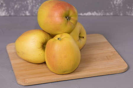 Fresh apple on a wooden desk.の写真素材