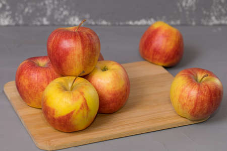 Fresh apple on a wooden desk.の写真素材