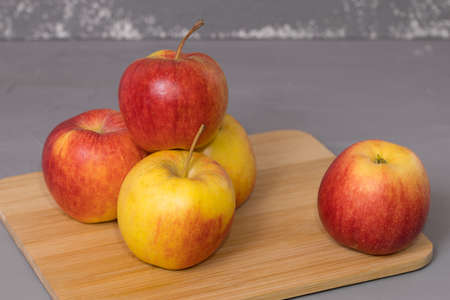 Fresh apple on a wooden desk.の写真素材