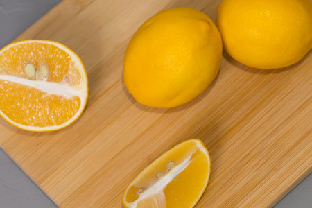 Fresh lemon on a wooden table.の写真素材