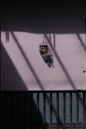 Simmetry lines with a shodows on the balconyの写真素材