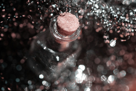 Small bottle with  a cork with the blurred backgroundの写真素材