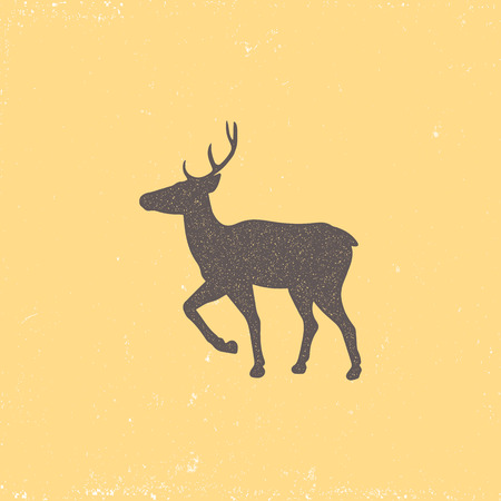 Vintage brown deer emblem on a yellow background. Grunge badge, typogrphic symbol suitable for T-shirts or print. Isolated vector illustrationのイラスト素材