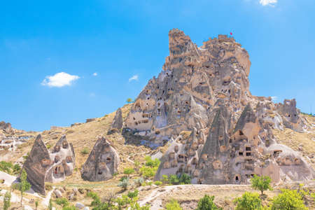 Different houses in the rock. Amazing landscapes of Cappadocia, Turkey.の写真素材