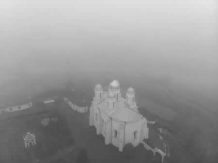 Beautiful view of Zimnensky Svyatogorsky monastery from above. View of the domes and the Assumption Cathedral.の写真素材