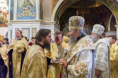 Kiev, Ukraine - July 11, 2018: His Beatitude Metropolitan of Kiev and All Ukraine Onufriy (Berezovsky) the anointing of a monk at an evening service at the Kiev Pechersk Lavra.のeditorial素材