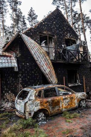 Irpin, Kyev region Ukraine - 04/09/2022: Cities of Ukraine after the Russian occupation. Cars burned...